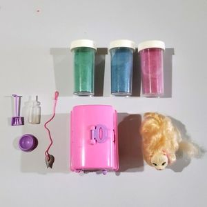 Toy cat with litter box